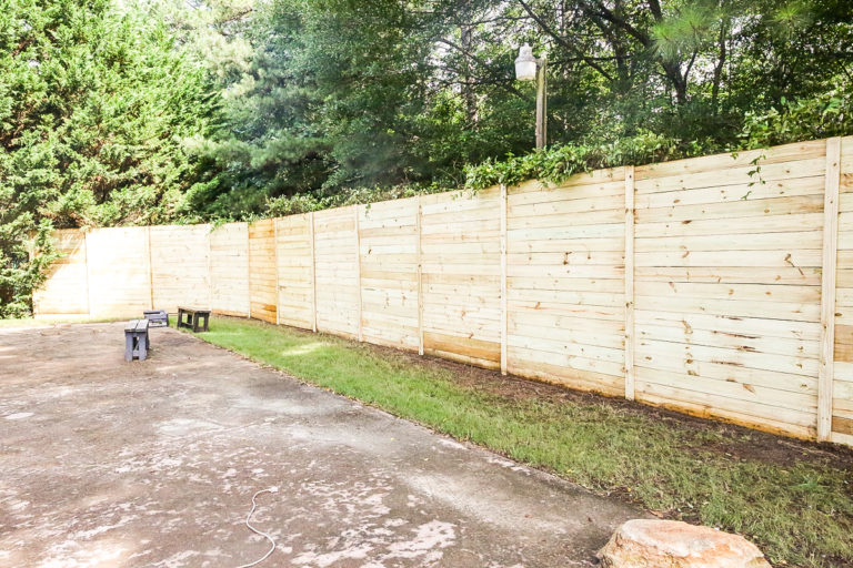 How to Build A Wood Fence On A Chainlink Fence - Bower Power